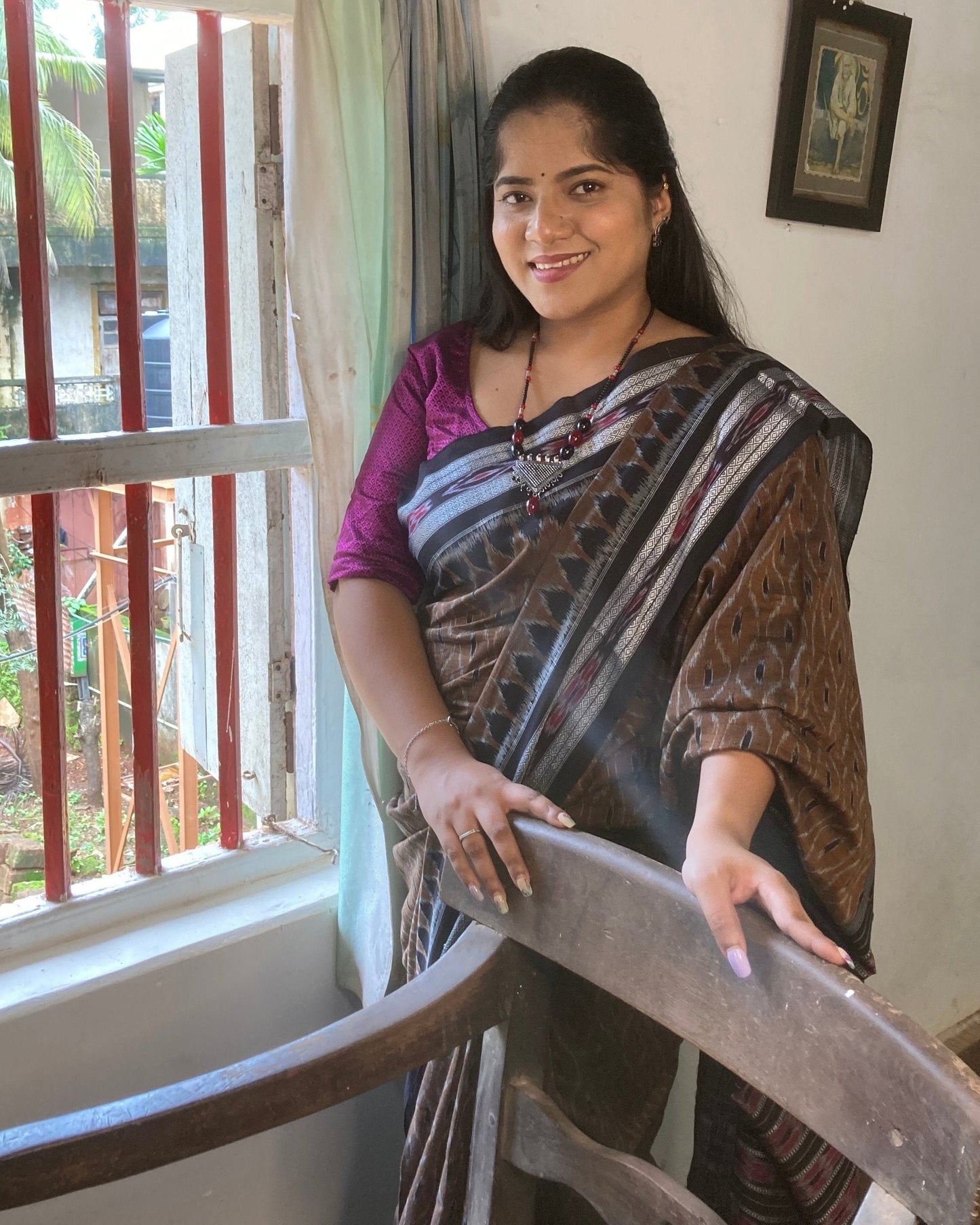 Chocolate brown Sambalpuri Ikkat saree